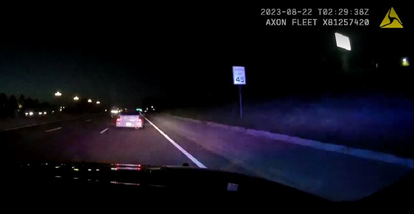 Dashboard footage from a Parker Police Department police officer attempting to pull over a white Chevy Monte Carlo after reported to be involved in a shoplifting incident. The police are searching for the driver of the white Chevy Monte Carlo following a fatal hit-and-run.